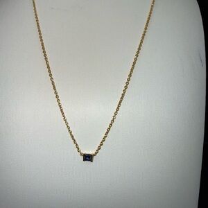Elegant Gold Necklace with Blue Gemstone